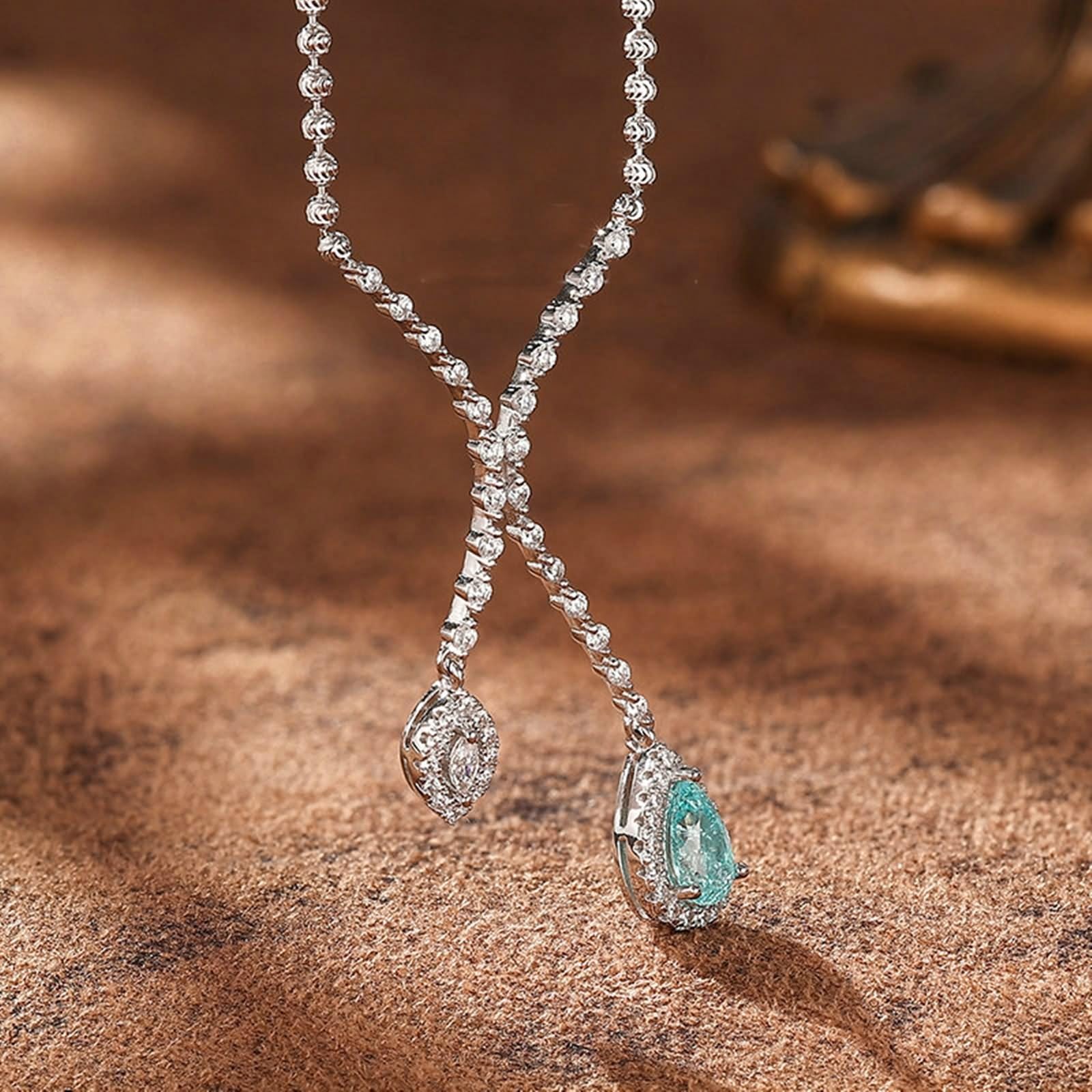 Łańcuszek przyjaźni damski, łańcuszek na szyję z wisiorkiem Infinity z turmalinem Paraiba i moissanit 18-karatowe białe złoto 45 cm