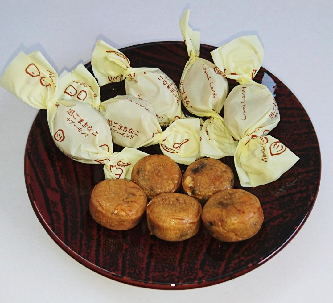 Amazon.co.jp: 日進製菓 黒ごまきなこ+アーモンド 70g×12袋 : 食品