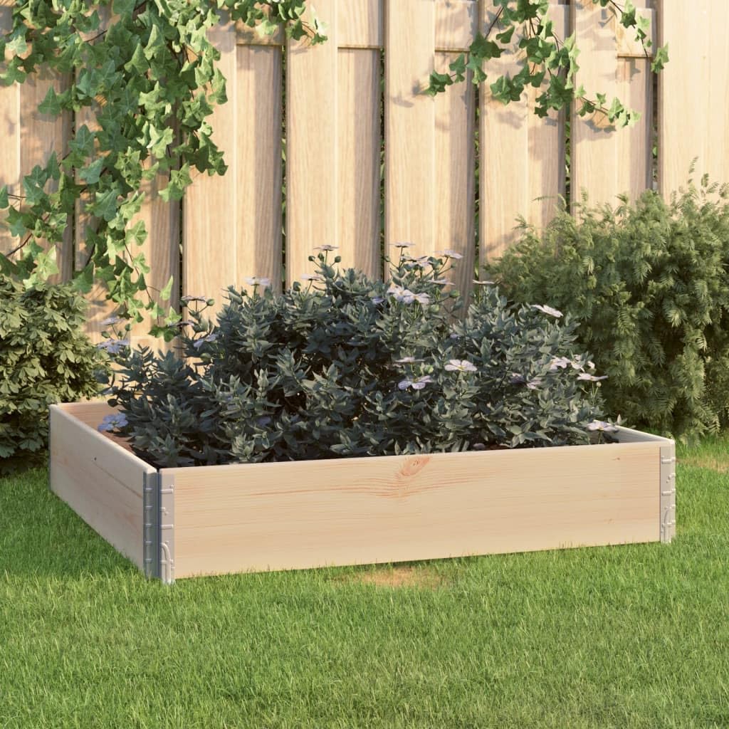 Cama elevada de madera para diseñar un huerto familiar en el jardín o césped