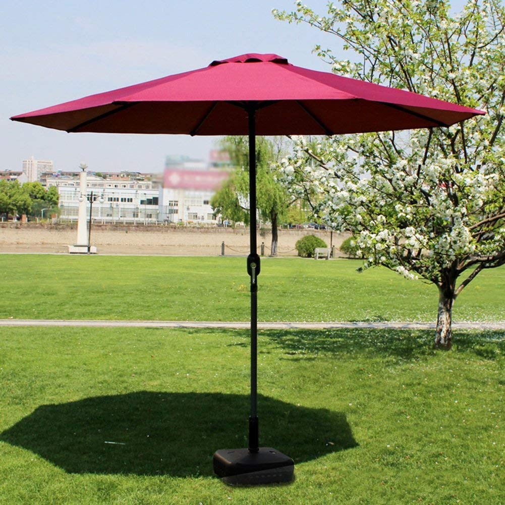 Sombrilla para el sol que evita quemaduras UV en jardín con estructura estable de hierro