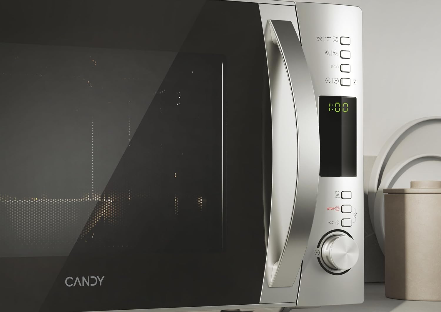 Enterijer view of the Candy X-Range CMXG 30DS Microwave showing the turntable