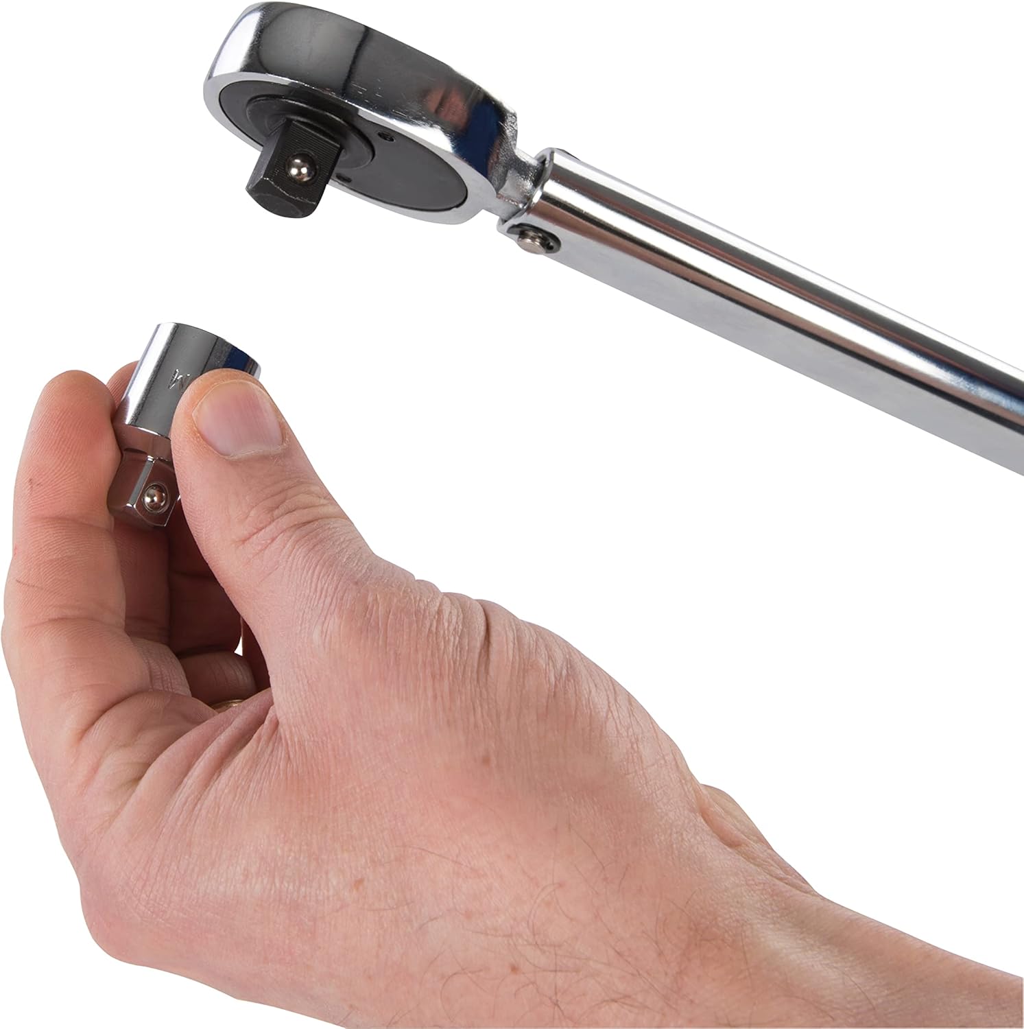 Hand attaching a drive adapter to the torque wrench