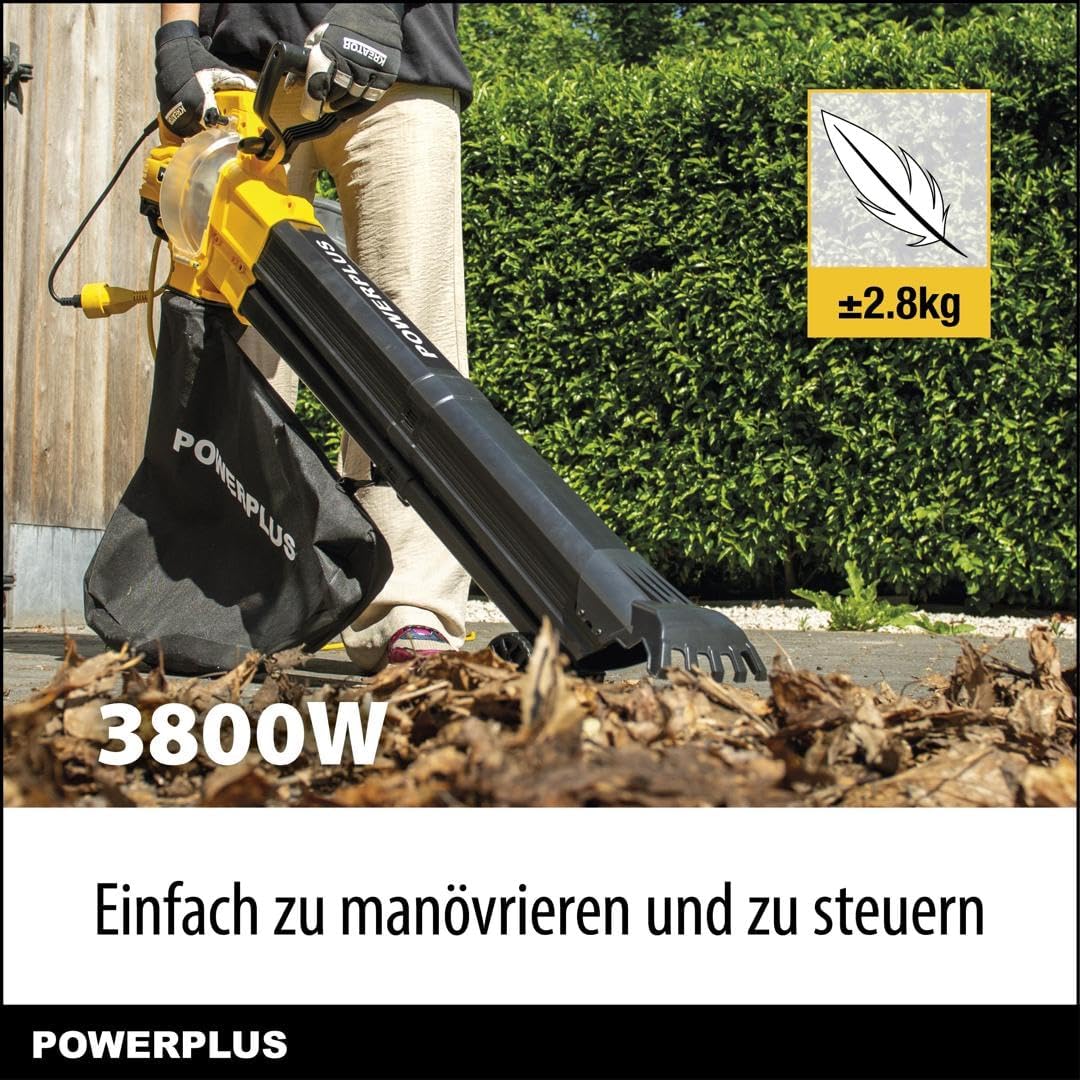 Person operating the Powerplus POWXG4039 leaf blower to clear leaves