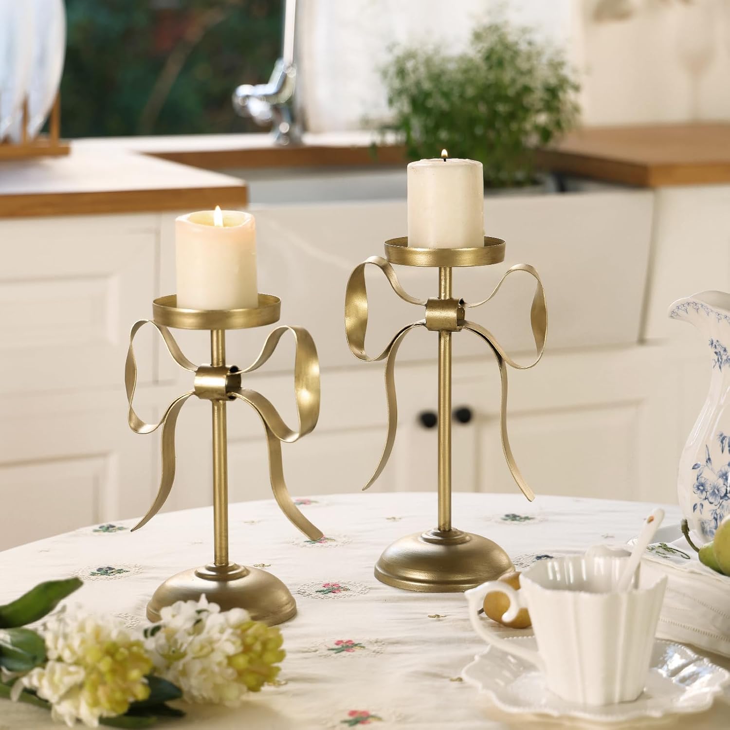 NIKKY HOME Gold Bow Iron Pillar Candle Holders Set of 2, Vintage Decorative Candlesticks Stand Centerpieces Decor for Dining Room Table Wedding Party Mantle Fireplace Housewarming Gift