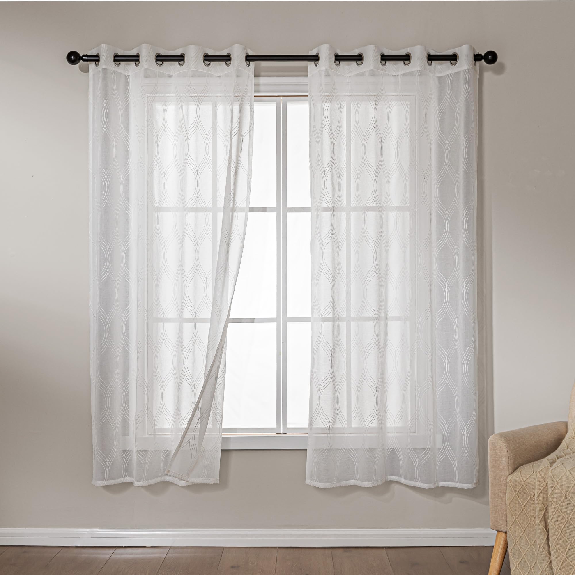 

                                                    Amazon Basics 2-Piece Embroidery Sheer Curtain Set