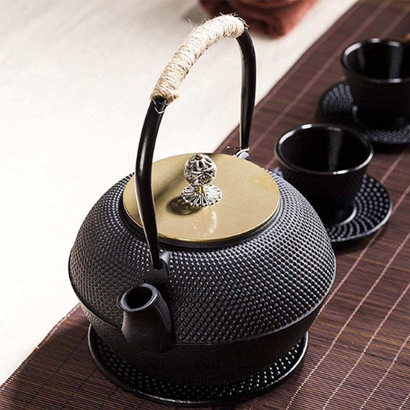Teiera in ghisa con infusore Tetsubin fatto a mano Bollitore in ghisa Teiera con infusore in acciaio inossidabile Bollitore per piano cottura a gas Teiera nera 1200 ml Teteras para fogón