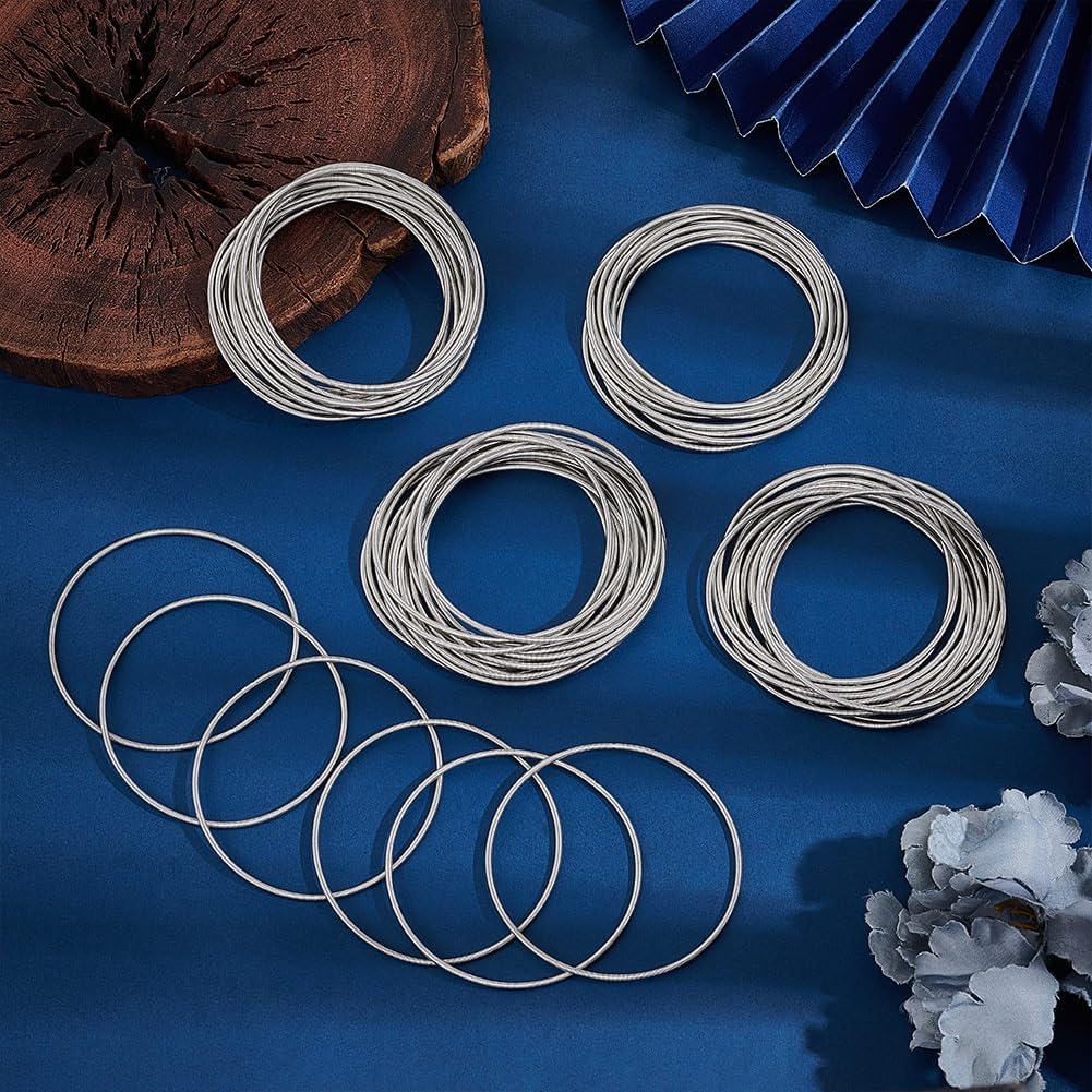 UNICRAFTALE 60pcs Minimalist Stainless Steel Spring Chain Stretch Bracelets, 58.5mm Guitar String Coil Bracelets for Women, Metal Bangle Bracelets, Stackable Bracelets, Wire Layered Bracelet