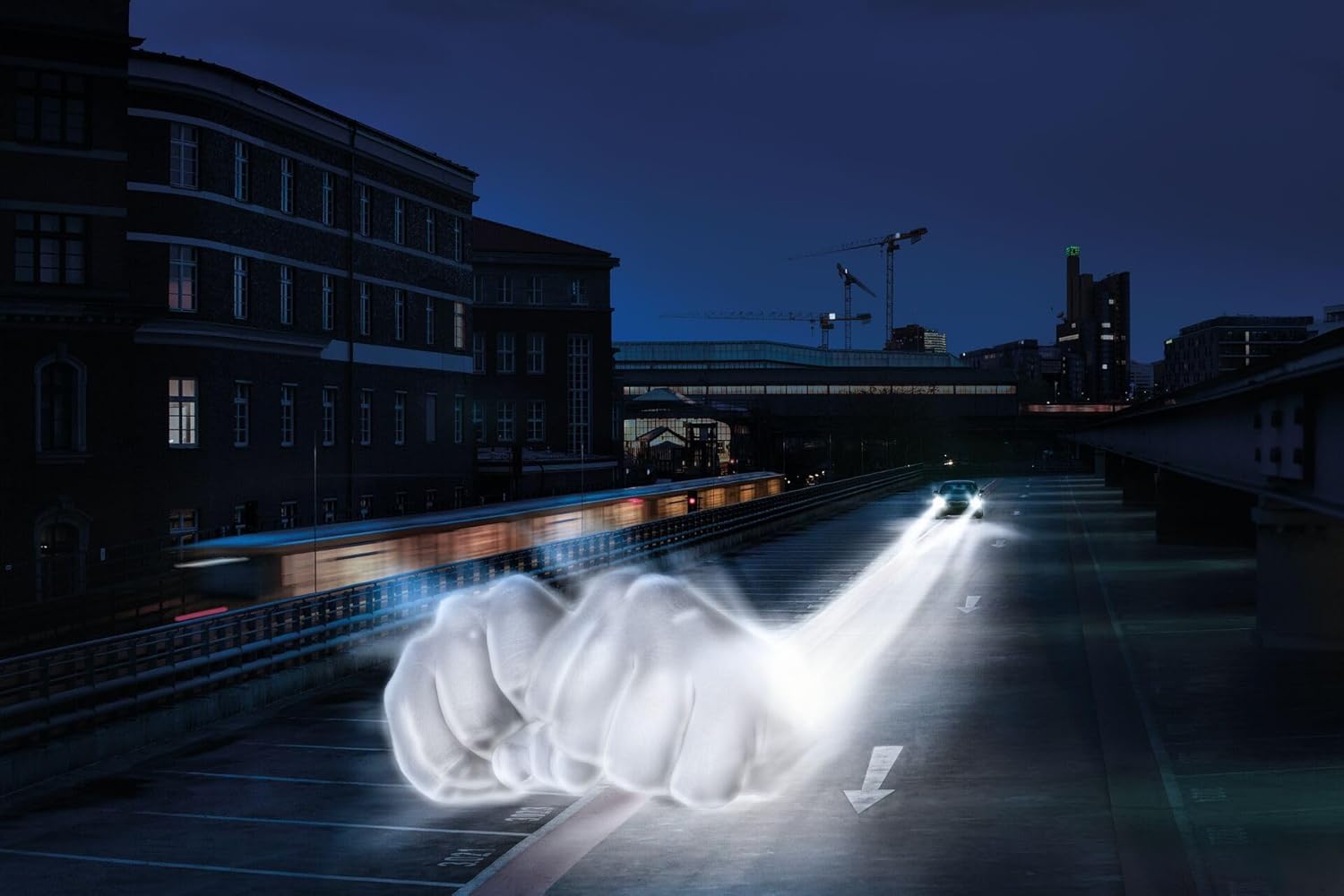 Car driving at night with bright headlights illuminating the road, demonstrating enhanced visibility.