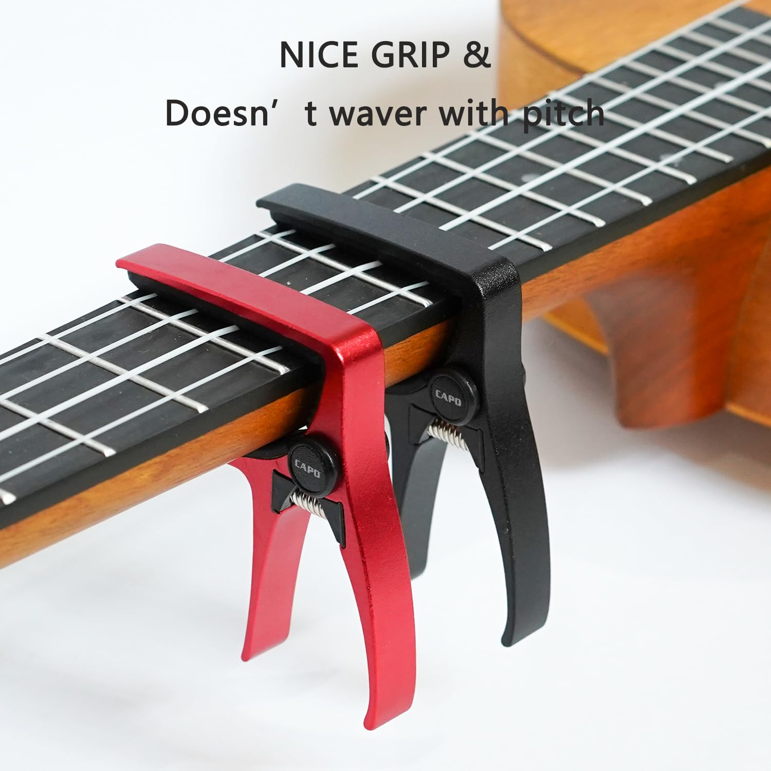 Kapodaster ukulele na 4-strunową gitarę i mandolinę, mini rozmiar profesjonalne ukulele kapodaster czerwony