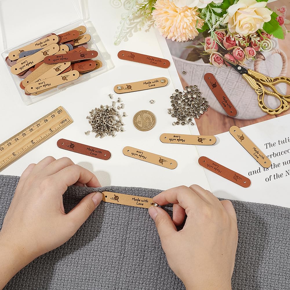 FINGERINSPIRE 48 Sets PU Leather Label 6.4x1.2cm Beige Chocolate Saddle Brown Oval Leather Crochet Labels Ball of Yarn Pattern Handmade Embossed Tag with Rivets for Clothing DIY Knitting Crafts - Image 3