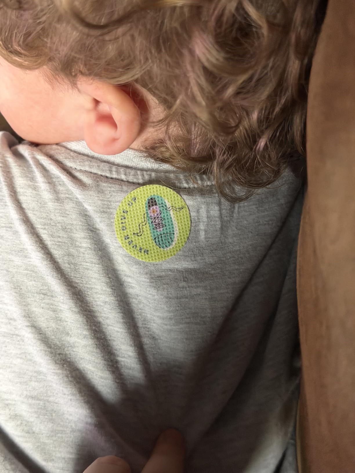 Kidoo Patch worn outdoors — verified customer photo