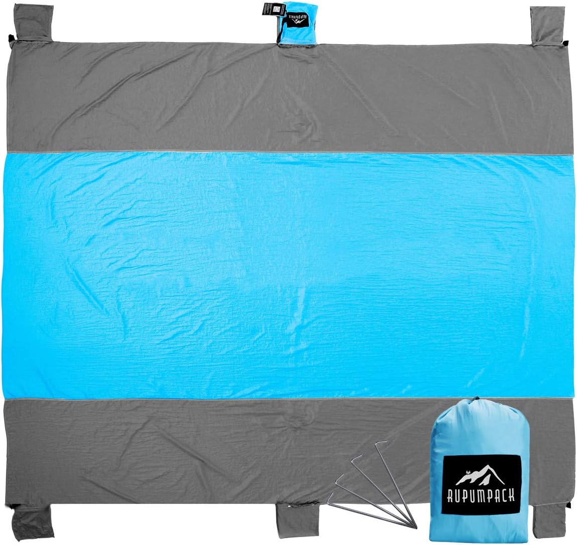 RUPUMPACK Sand Escape Compact Outdoor Oversized Beach Blanket - 9ft X 10ft, Portable Picnic Mat, Strong Parachute Nylon, Includes Four Stakes, Built in Sand Anchors & Valuables Pocket