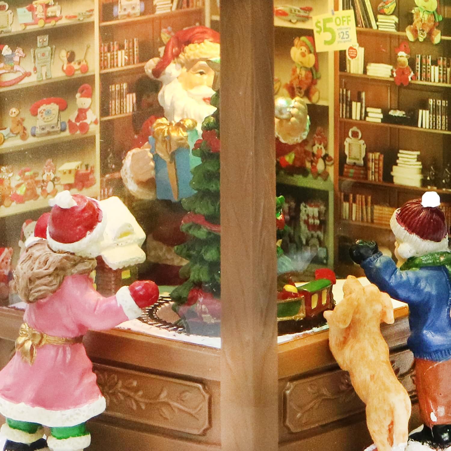 MOMENTS IN TIME Lighted Santa’s Christmas Village Shop LED Lights, Music & Animation Battery Operated 8.8” Holiday Building Christmas Decoration