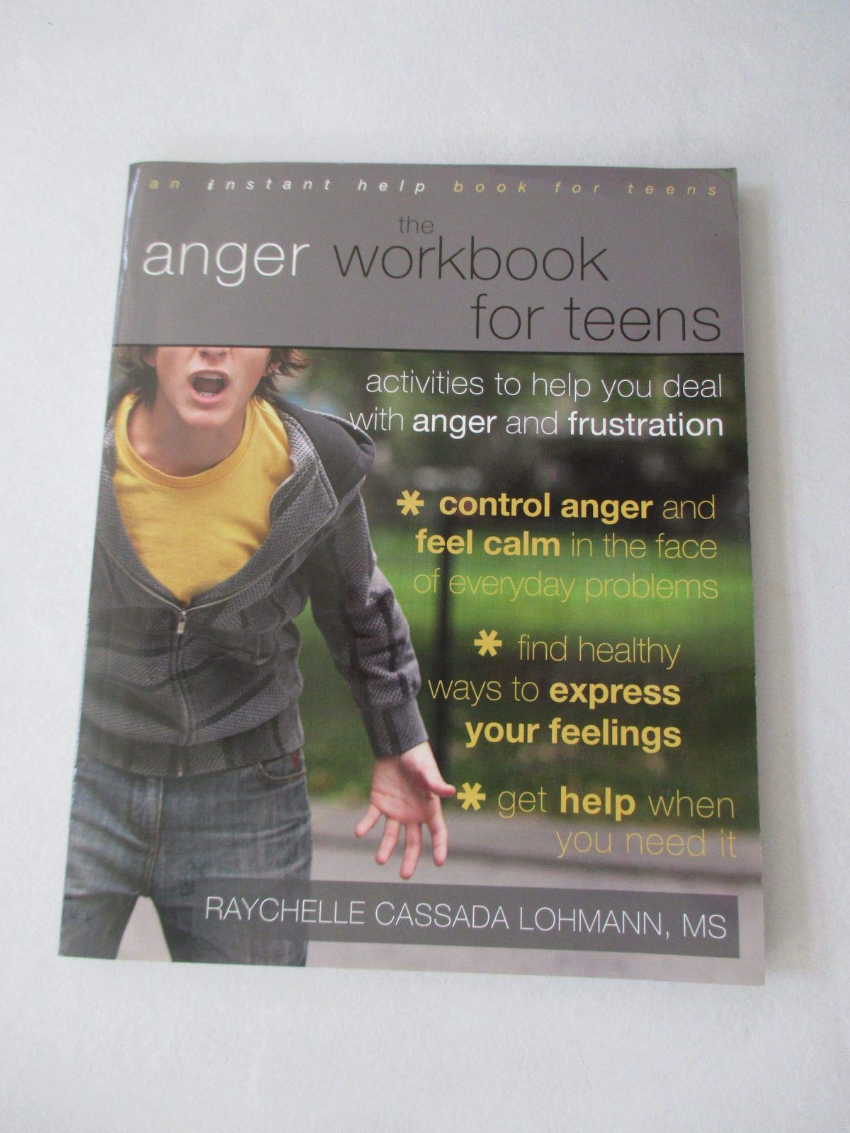 The Anger Workbook for Teens: Activities to Help You Deal with Anger and Frustration Paperback – December 2, 2009