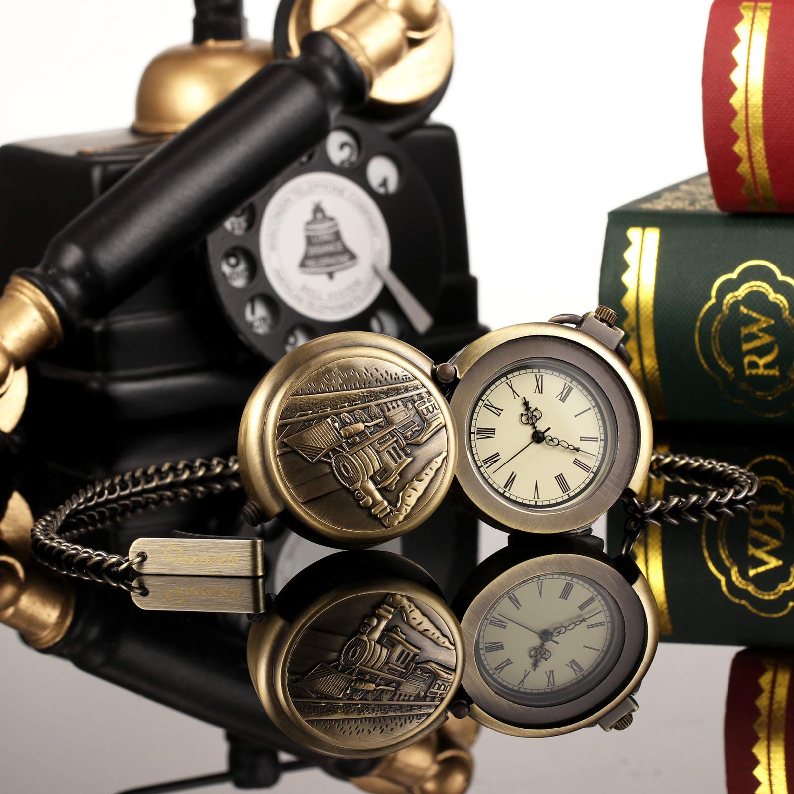 TREEWETO Reloj de bolsillo unisex con cadena, analógico, cuerda manual, forma especial, grande, hueco, bronce