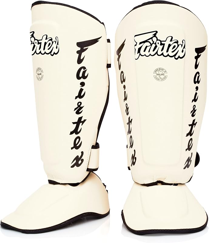 Fairtex SP7 Lightweight Shin Guards, Detachable Syntek Leather Shin Pads | Flexible composite hide with modular foot joint. Adjustable two-piece leg armor allows ninety-degree rotation for drills