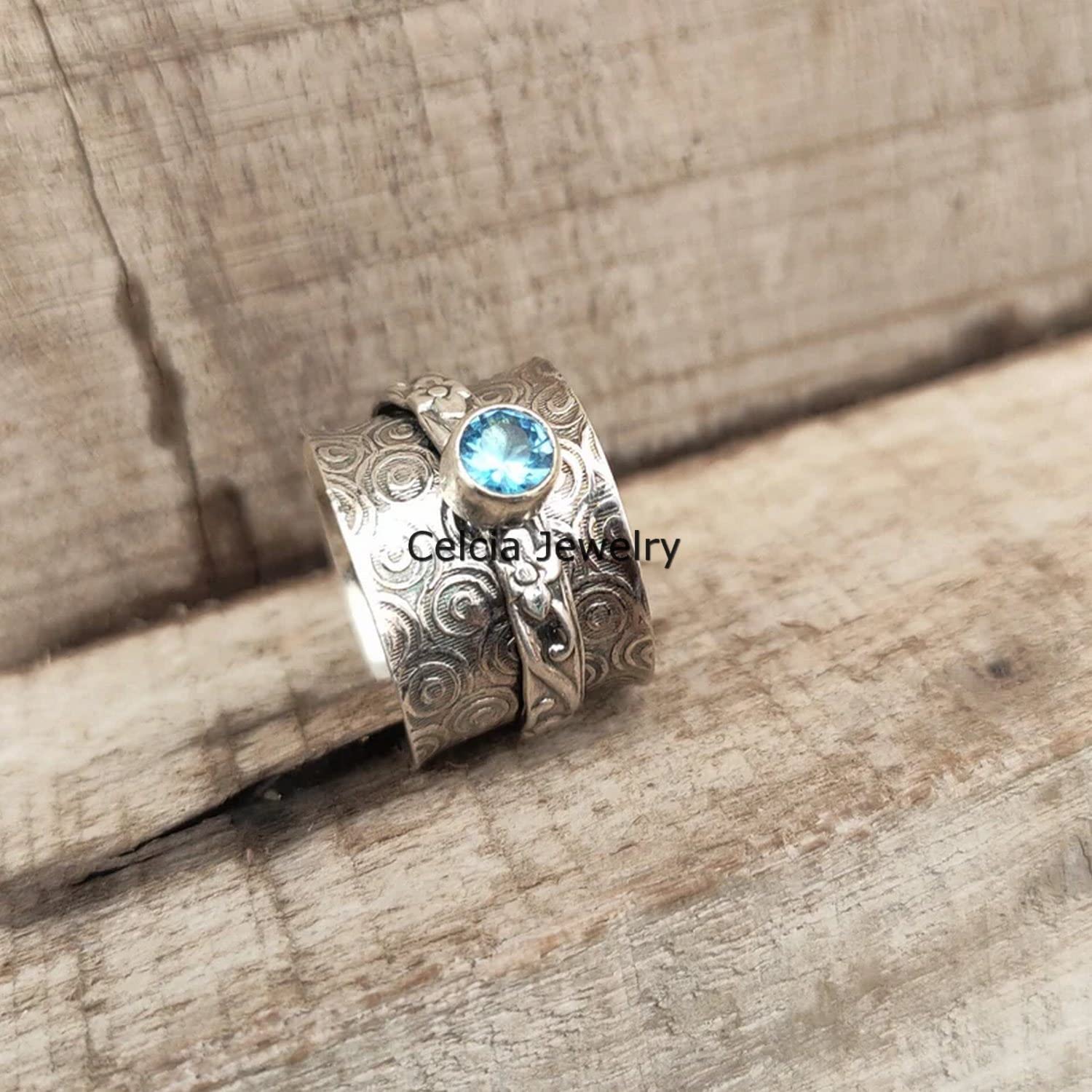 Anillo giratorio de plata facetado con piedra preciosa redonda de topacio azul para meditación y ansiedad