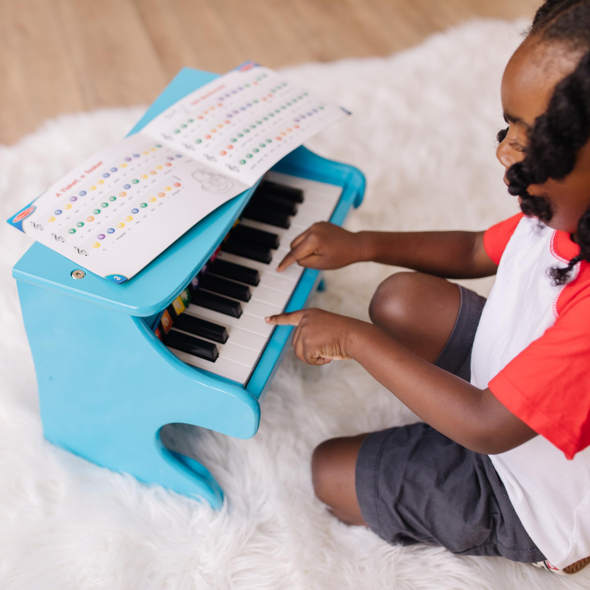 Melissa & Doug Learn-to-Play Piano with 25 Keys and Color-Coded Songbook - Blue product thumbnail 3