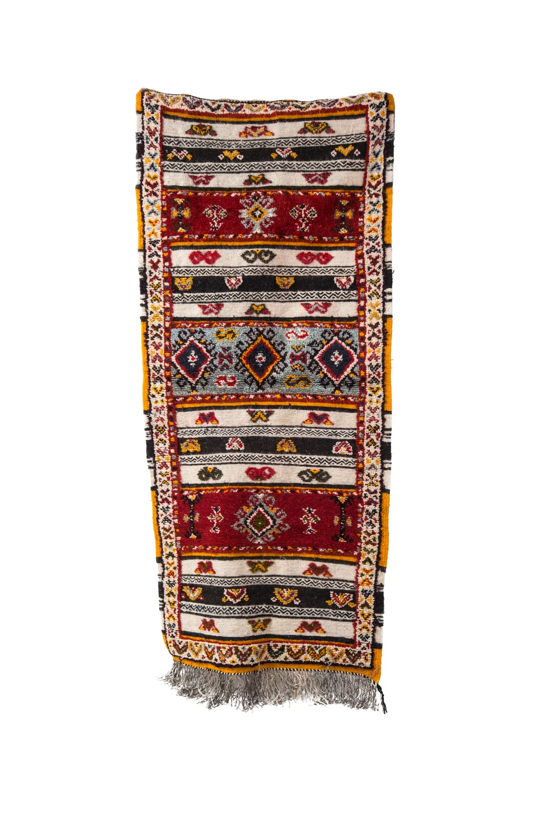 Tapis marocain en 100 % laine richement brodé de graphismes authentiques