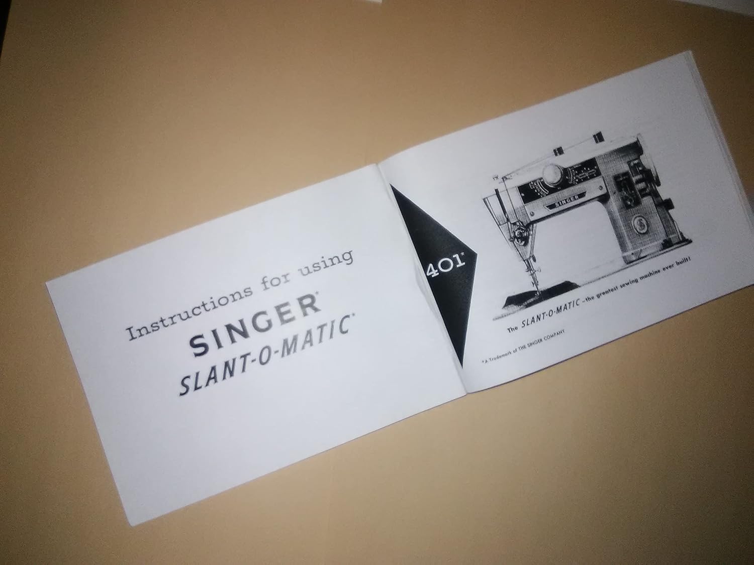 Inside pages of the Singer 401A manual showing diagrams for winding the bobbin and instructions for removing and replacing the throat plate.