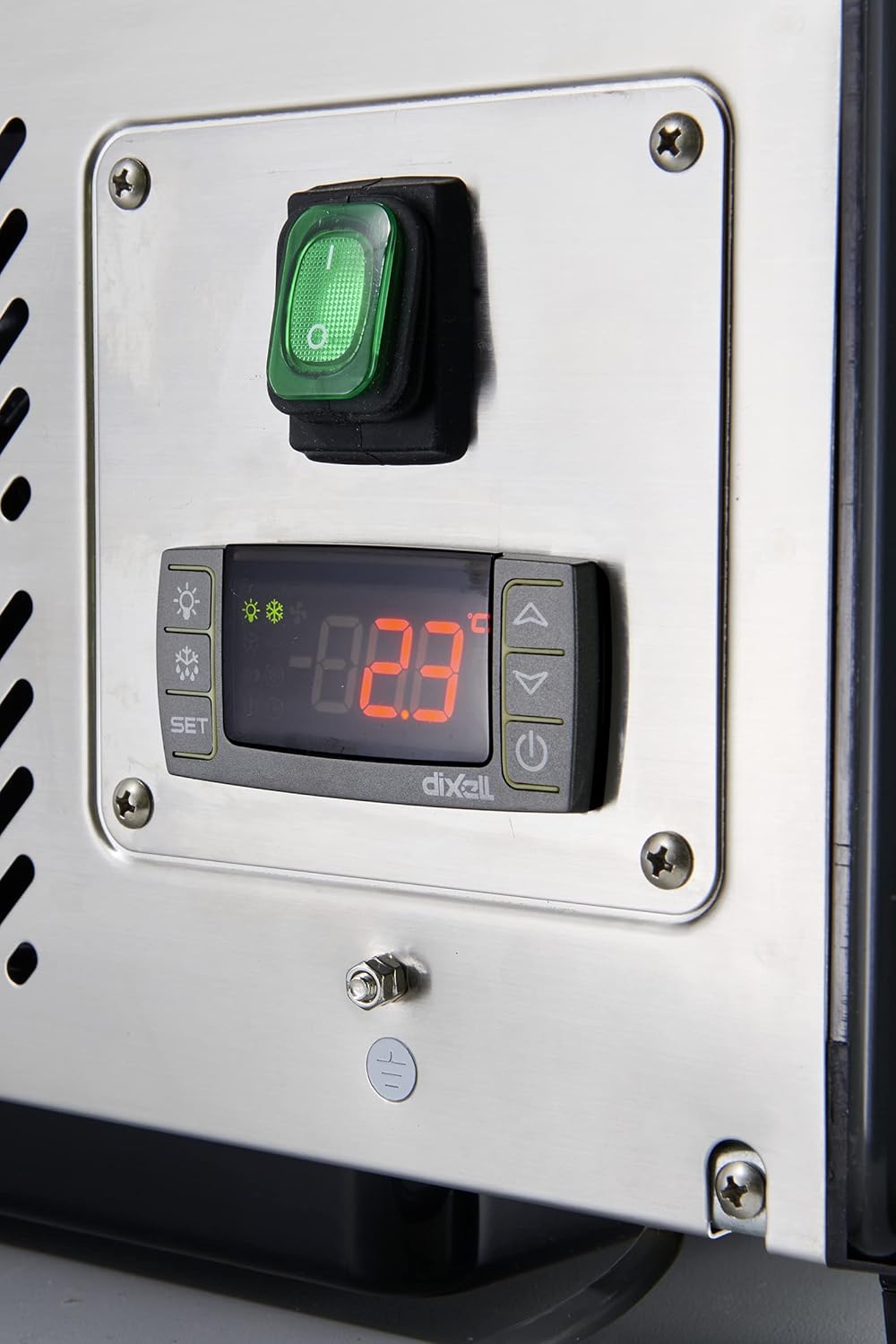 Close-up of the digital thermostat and power switch on the METRO Professional GCV1600 display case, showing temperature display and control buttons.