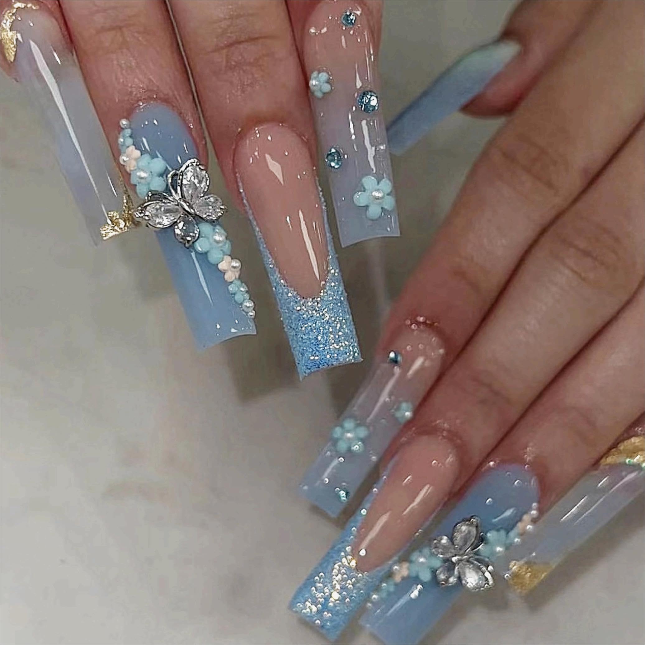MERVF Long Press on Nails Square Fake Nails Press ons Ombre Blue French Tip Glue on Nails with 3D Butterfly Flower Design Glitter Squoval Acrylic False Nails Glossy 24Pcs