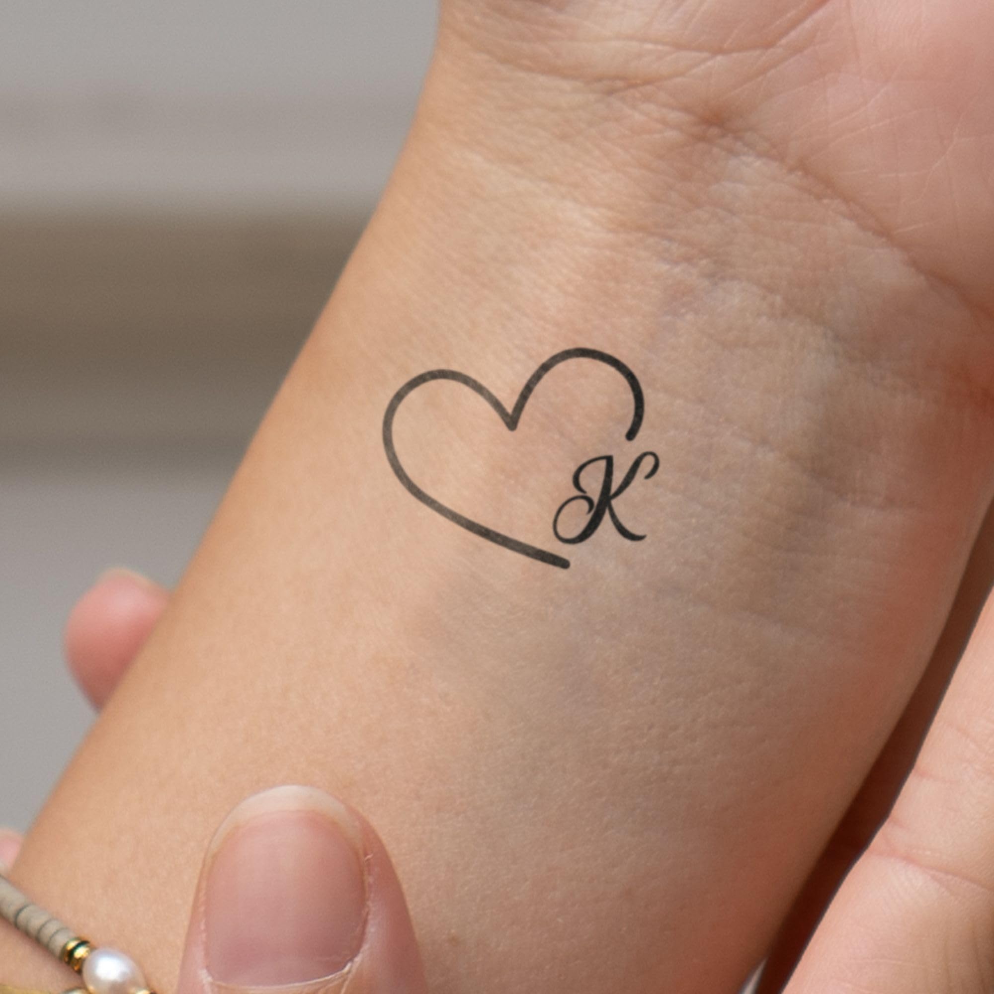 tattoo herz mit buchstabe m