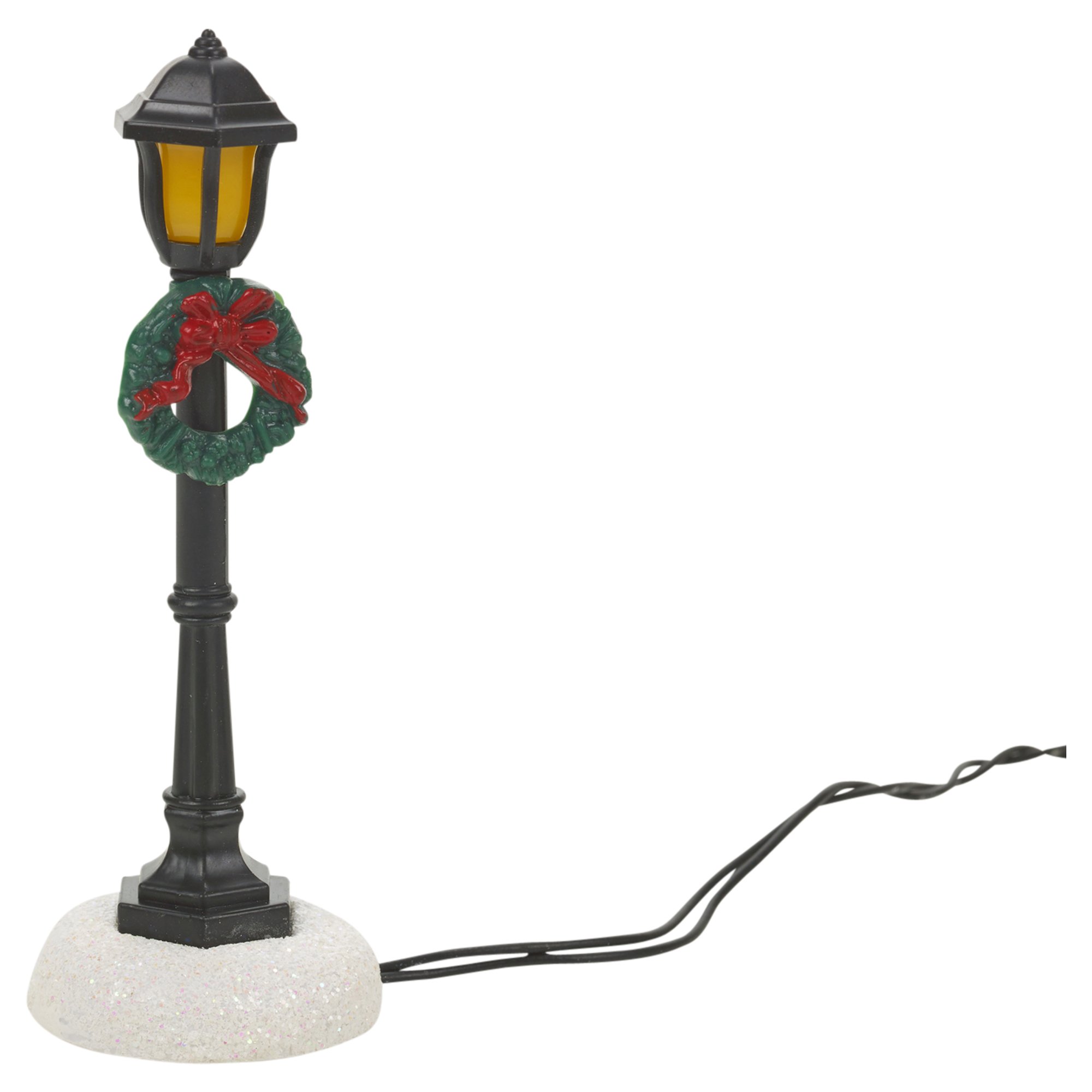 Pueblo en invierno de Navidad con luz led