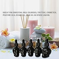 Vista 6 de Juego de 7 piezas 10ml Mini Botella cuentagotas de vidrio con forma de calavera a prueba de fugas para aceites esenciales para almacenamiento