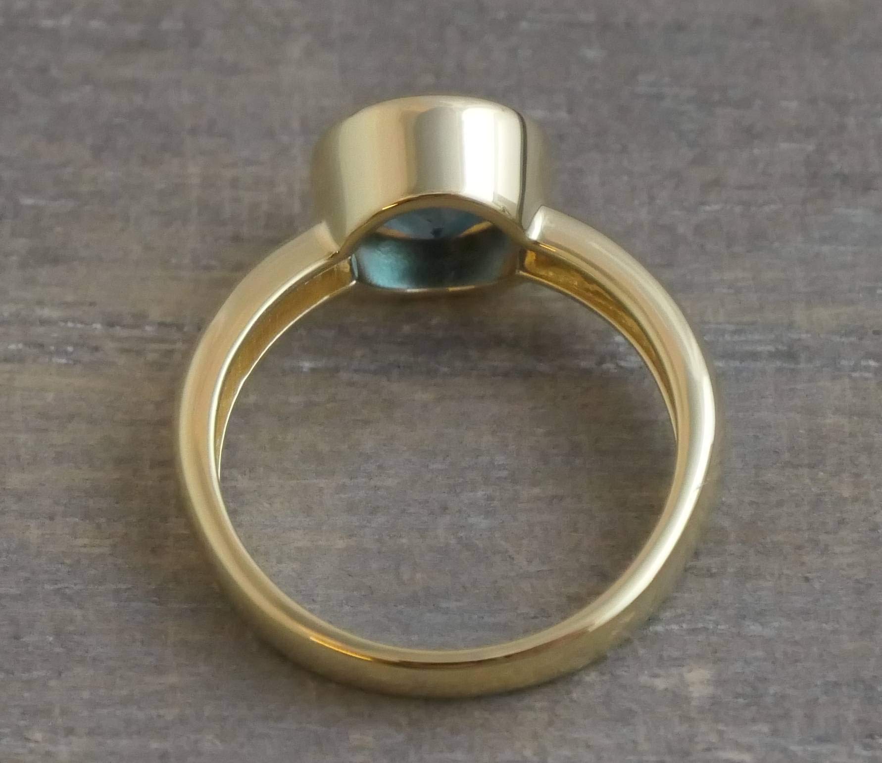 Anillo de Plata de Ley con baño de oro y Topacio Azul Londres