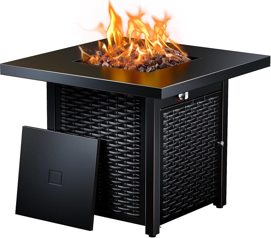 Ciays 28 Inch Propane Fire Pit Table with glowing lava rocks on a modern patio during sunset
