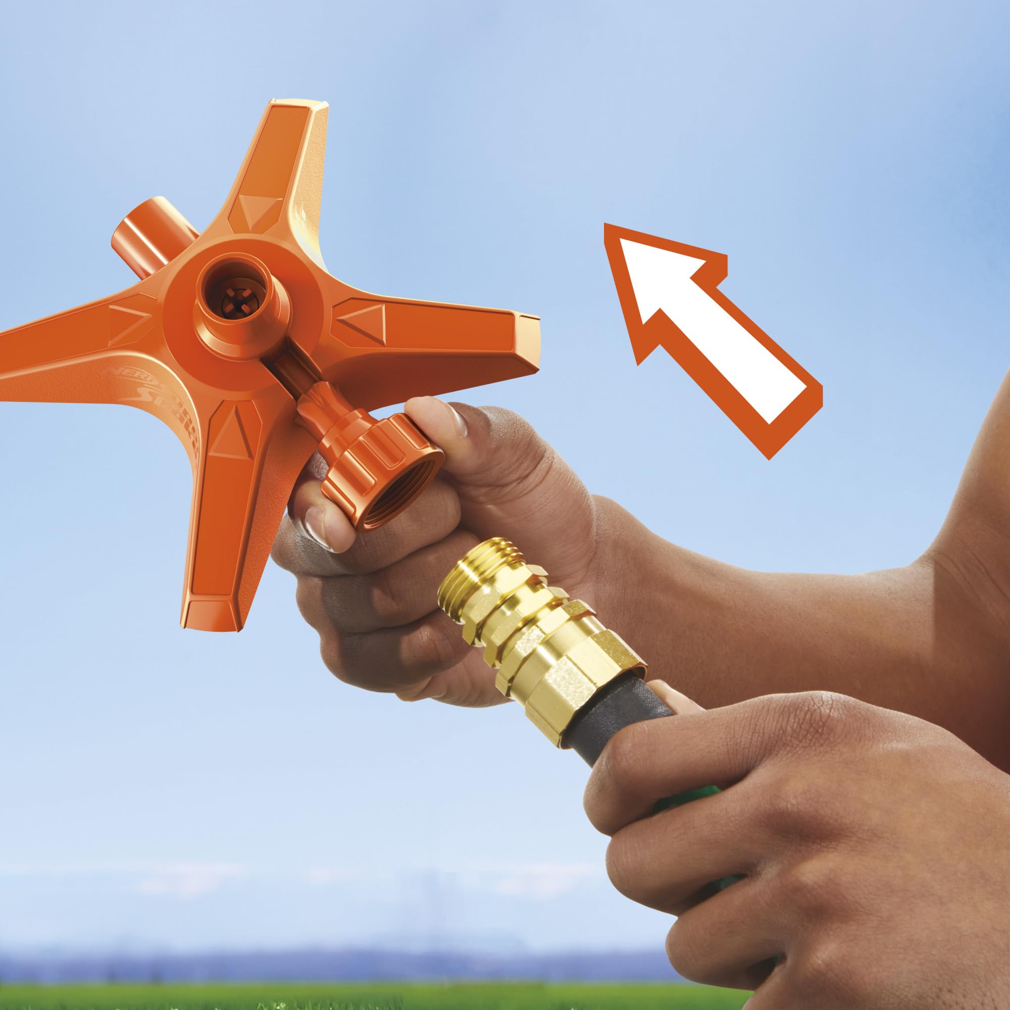 A hand connecting a garden hose to the orange Easy Fill Station.