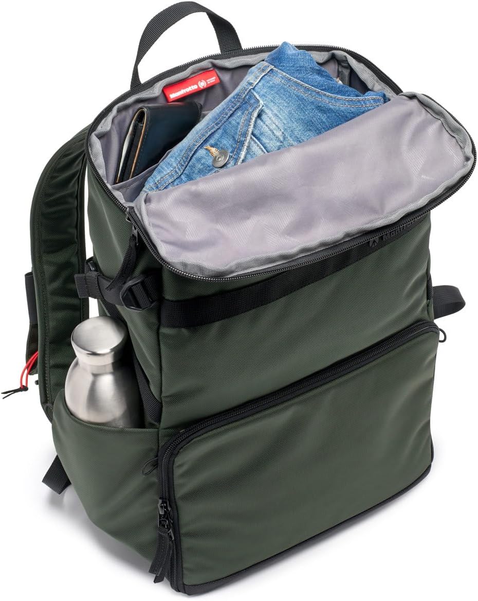Top compartment of the Manfrotto Street Slim Photography Backpack open, showing space for personal items like a jacket and water bottle.