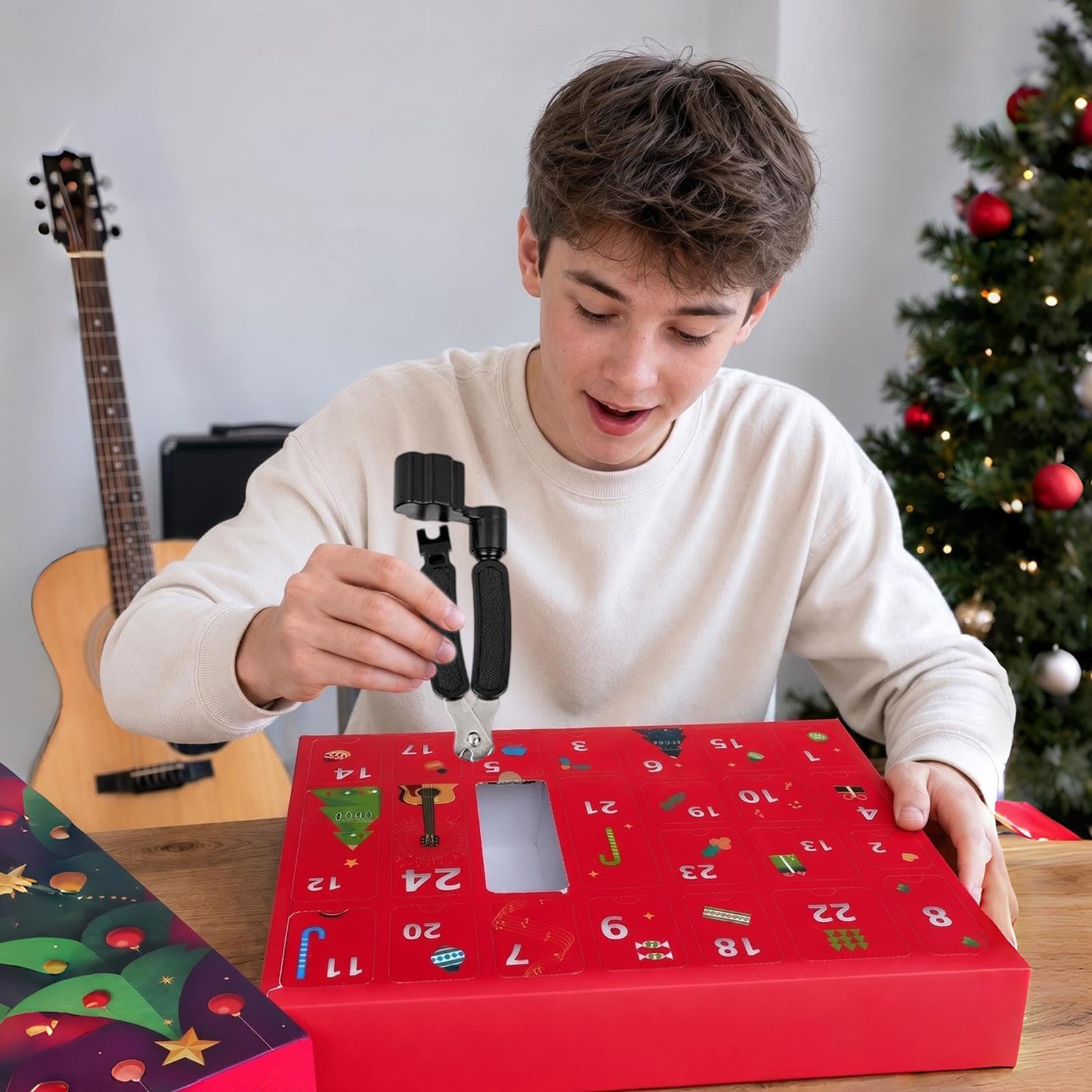 Calendario natalizio 2026 con chitarra 'Avvento 24 giorni, accessori