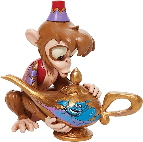 Enesco Disney Traditions by Jim Shore Aladdin Abu Holding The Genie - Figura de lámpara, 4.5 pulgadas, multicolor