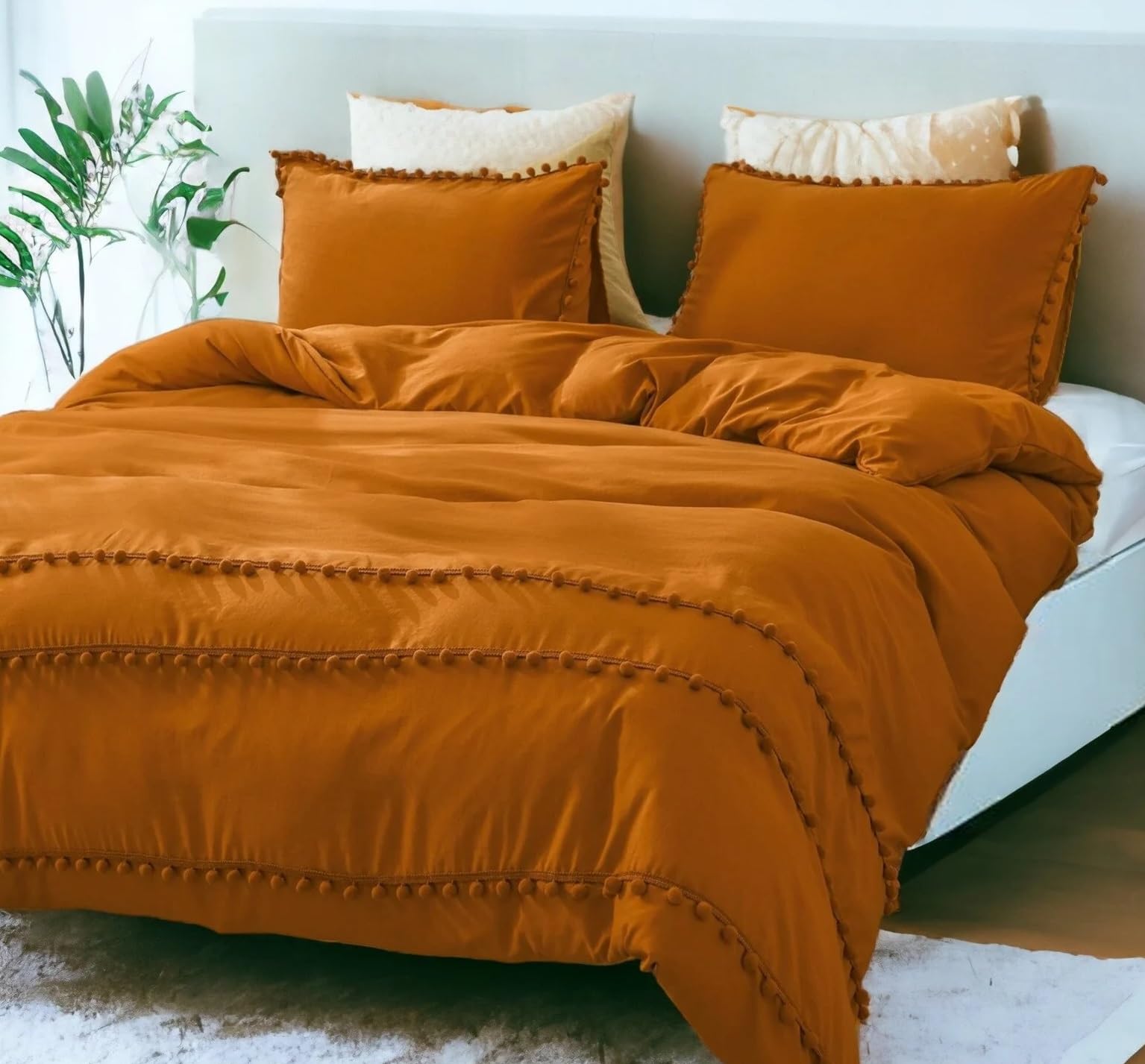 Funda nórdica con pompones de óxido de Canela para renovar dormitorios fríos con algodón suave