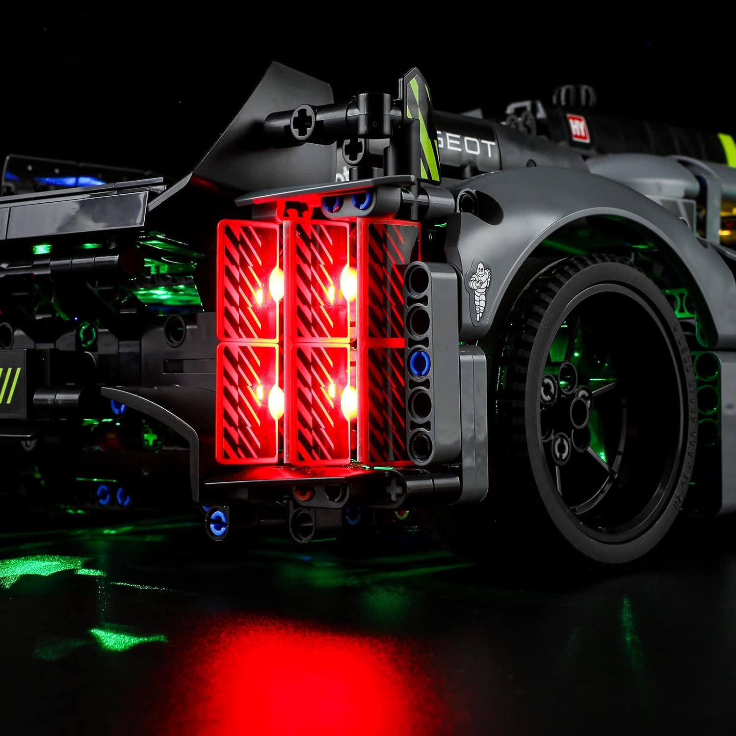 Rear view of the LEGO Technic Peugeot 9X8 24H Le Mans Hybrid Hypercar illuminated by the BRIKSMAX LED kit