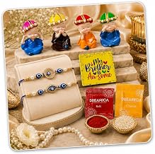 Dreamica Rakhi Gift Combo | Monk Buddha Showpiece Set with 2 Designer Rakhi, My Brother Is Awesome Fridge Magnet, Greeting Card & Tilak Set | Raksha Bandhan Hamper for Brother