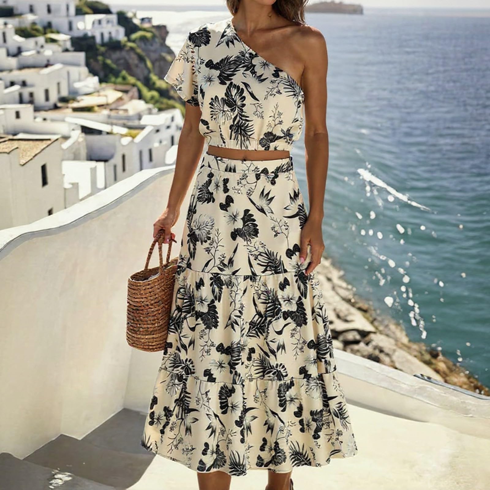 Conjunto de Dos Piezas de Camiseta y Falda con Estampado Floral y Escote asimétrico para un Look Casual. Cómoda túnica con Falda Midi fluida.