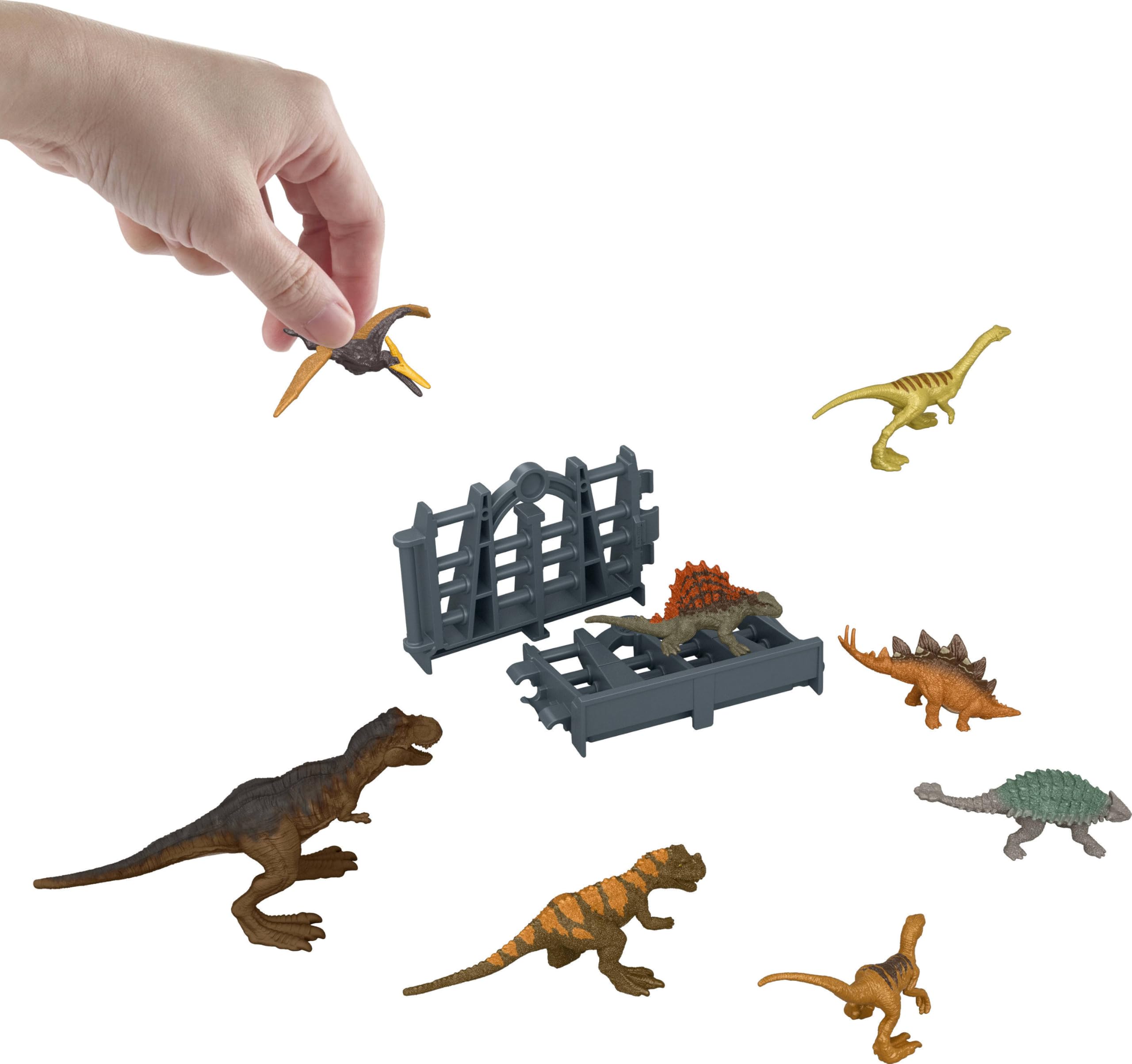 Mattel Jurassic World Minis Wyspa Dinozaurów Kalendarz adwentowy Zestaw, 24 dni niespodzianek, 19 minidinozaurów, 1 figurka człowieka, 4 akcesoria, figurki zabawki dla dzieci 4+, JLD23