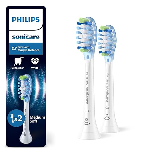 Philips Sonicare Lot de 4 têtes de brosses à dents électriques soniques C3 Premium Plaque Defence, Blanc (Modèle HX9044/17)