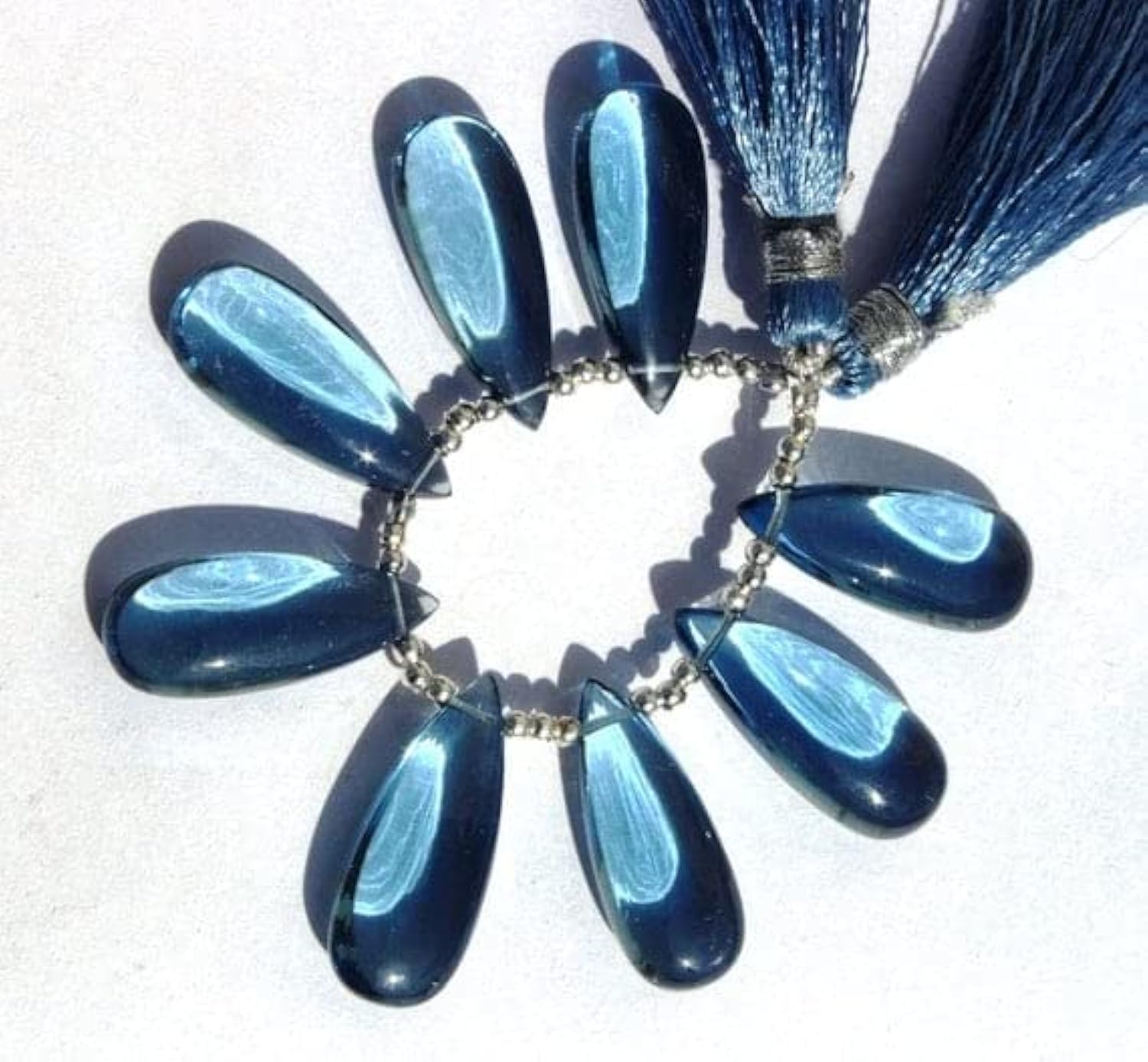 Quartz bleu Londres haut de gamme 4 briolettes poires lisses 25x10 mm