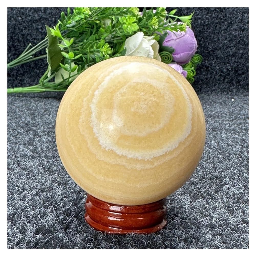 Bola de cuarzo calcita amarillo para decorar tu salón o rincón de yoga
