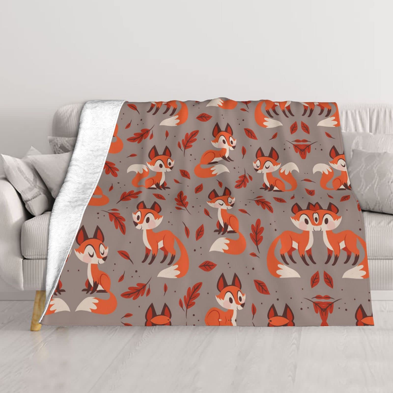 Couverture de canapé imprimée renard pour vos soirées de camping cocooning
