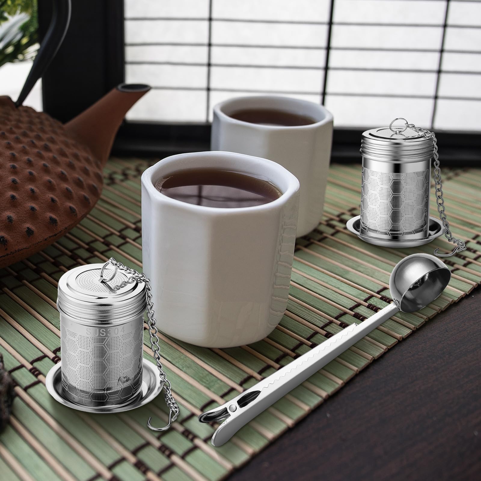 Umigy 4 Stück Tee-Ei Tee-Sieb für losen Tee mit Schaufel, extra feines Netz-Tee-Steeper 304 Edelstahl-Tee-Diffusor, Teeblatt-Halter mit verlängertem Kettenhaken für Tee, Gewürze, Gewürze