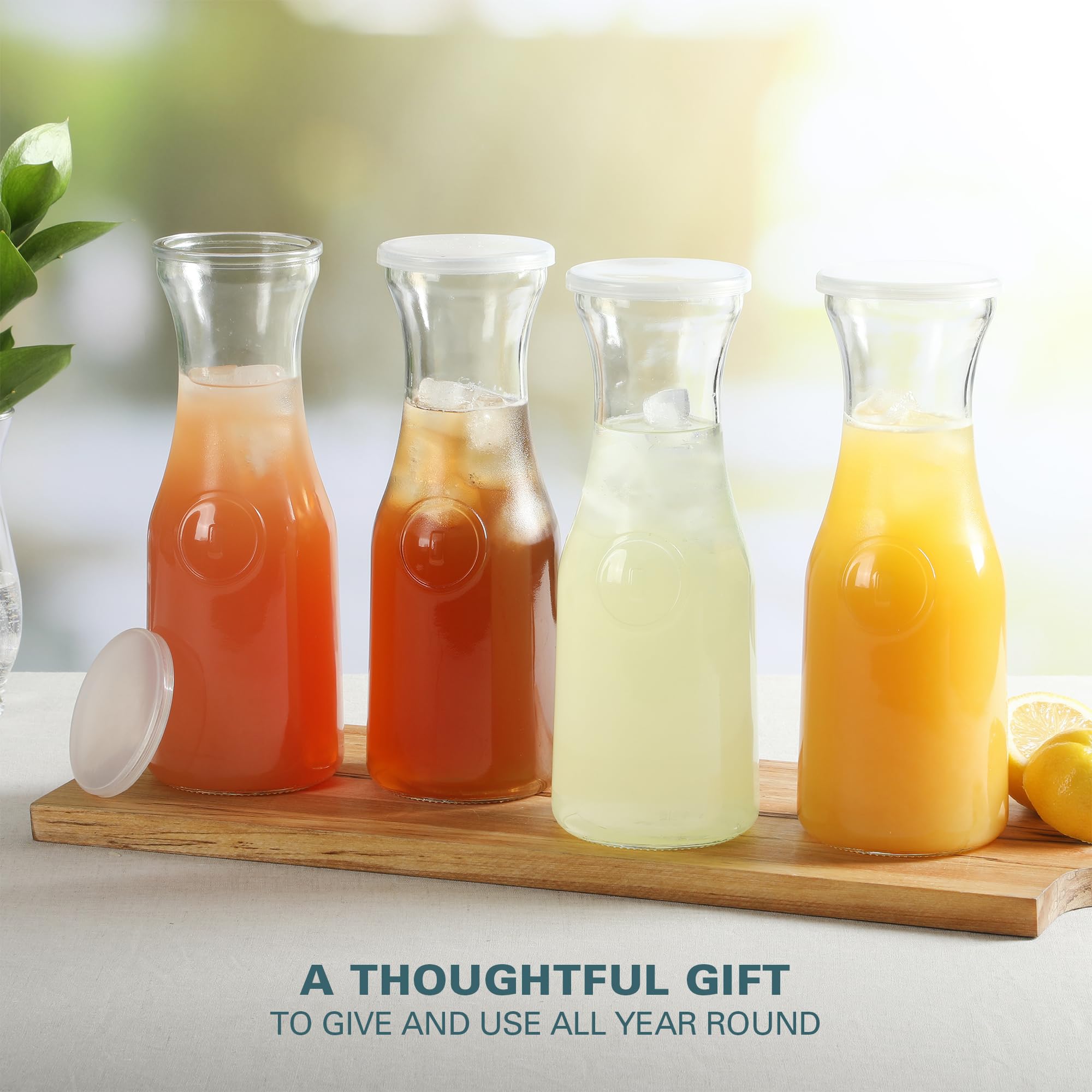 Gibson Home Windchill - Juego de 4 jarras grandes de vidrio con tapa, jarra de vidrio transparente de 2 litros, jarra de servir bebidas para bar mimosa, brunch, agua fría, jugo, leche, té helado