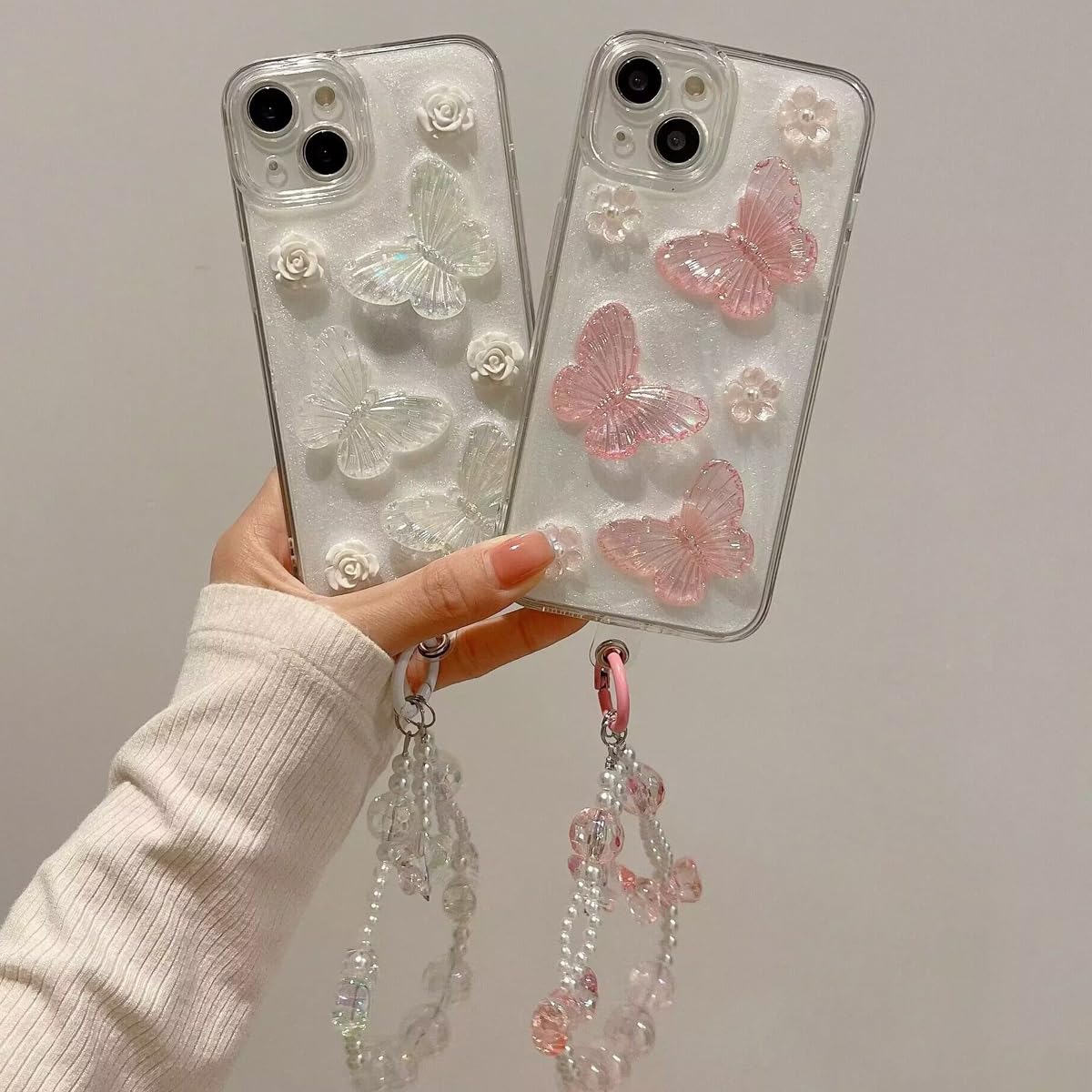Changjia Funda protectora para iPhone con diseño de mariposa con purpurina en 3D, con perlas de cristal y correa para la muñeca, estética, suave, TPU, para mujeres y niñas (rosa)