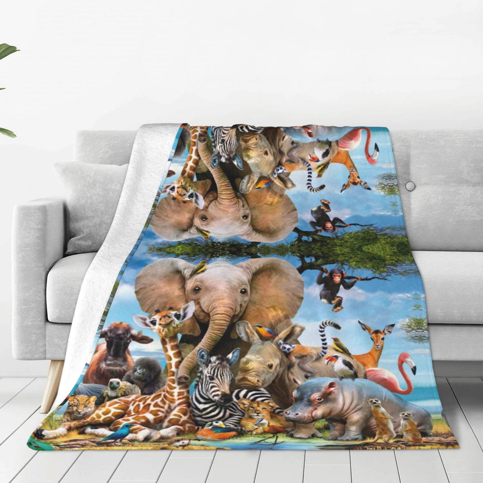 Couverture en flanelle imprimée animaux de safari avec finitions soignées
