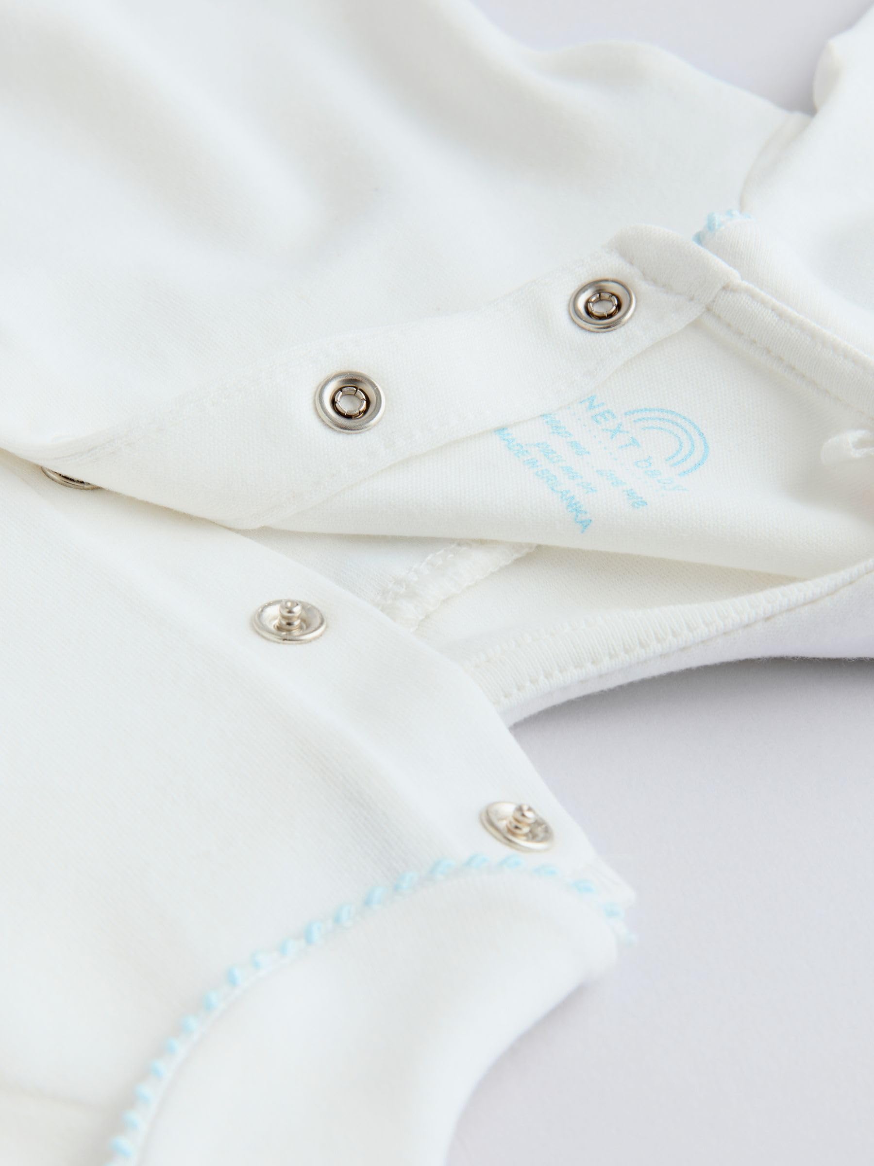 NEXT Bebés niño Conjunto de 3 piezas de punto con chaqueta, body y leggings para bebé