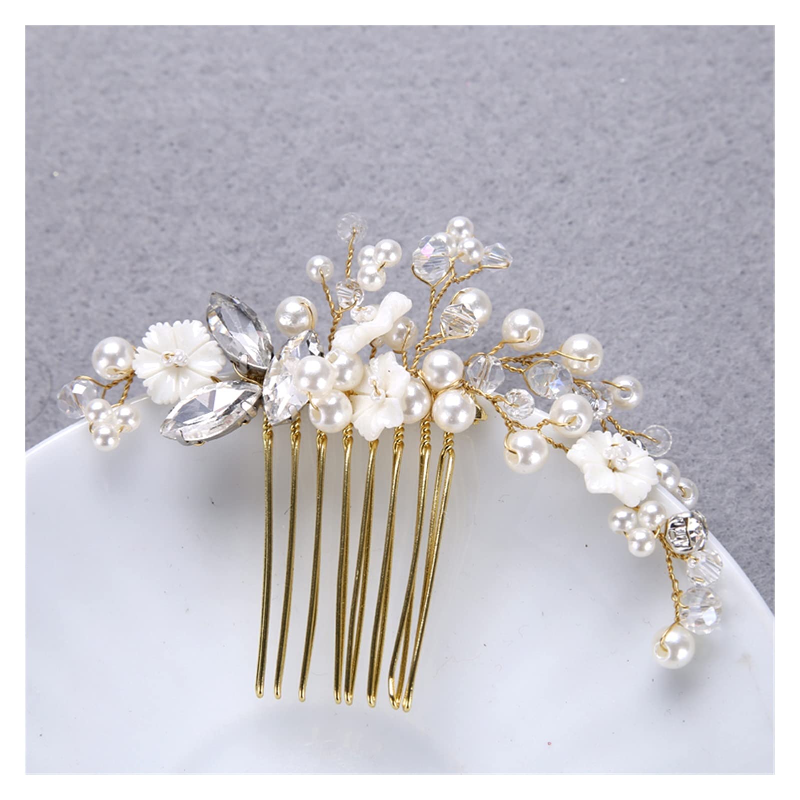 Peinetas de novia doradas con flores de concha y perlas elegantes 8